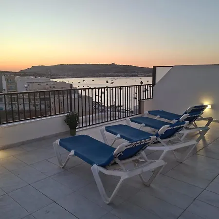 Bright Coastal Penthouse With Huge Terrace Overlooking The Sea- Ghadira Mellieha